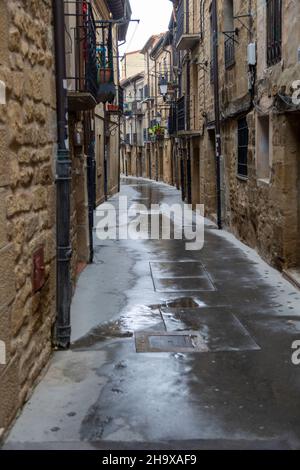 Narrow street historic buildings in village of Laguardia, Álava, Basque Country, northern Spain Stock Photo