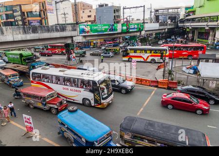 MANILA, PHILIPPINES - JANUARY 20, 2018: View of busy street in Pasay City, near EDSA LRT station. Stock Photo