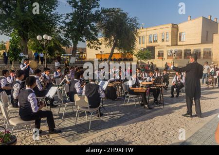 BUKHARA, UZBEKISTAN - APRIL 30, 2018: Musicians in the center of Bukhara, Uzbekistan Stock Photo