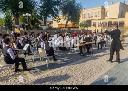 BUKHARA, UZBEKISTAN - APRIL 30, 2018: Musicians in the center of Bukhara, Uzbekistan Stock Photo