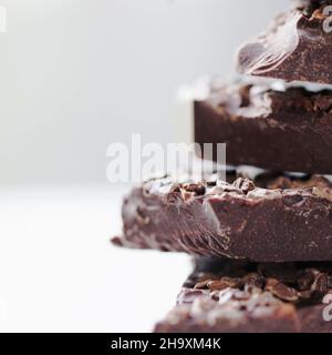 Close shot of blocks of chocolate in a stack Stock Photo