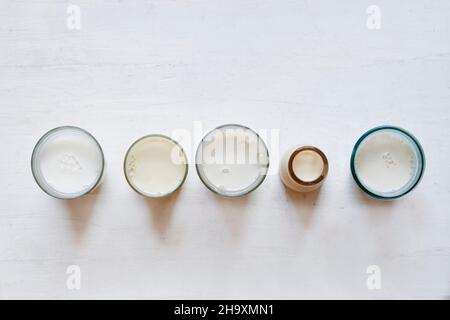 Various types of vegan milk in glasses Stock Photo