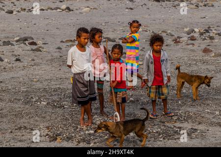 MT PINATUBO, PHILIPPINES - JAN 30, 2018: Impoverished local children on a lahar of Pinatubo volcano. Stock Photo