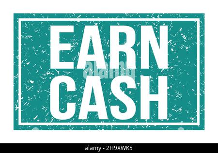 EARN CASH, words written on blue rectangle stamp sign Stock Photo