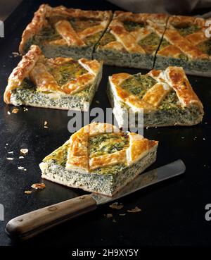 Crostata di ricotta: puff pastry tart with ricotta and spinach Stock Photo