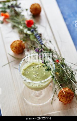 Heuschaumsuppe (Tyrolean vegetable soup) with baked mountain cheese dumplings, Austria Stock Photo