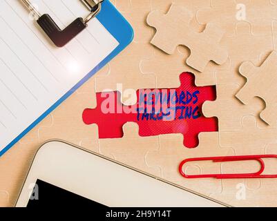 Handwriting text Keywords Targeting. Concept meaning Use Relevant Words to get High Ranking in Search Engines Building An Unfinished White Jigsaw Stock Photo