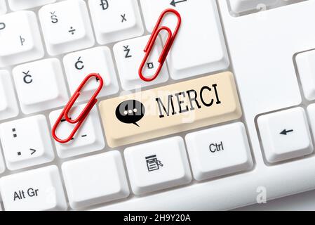 Text sign showing Merci. Word for what is said or response when someone helps you in France Thank you Abstract Doing Virtual Bookkeeping, Listing New Stock Photo