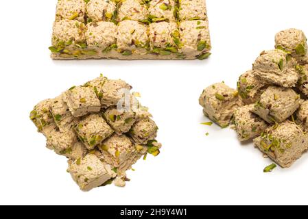 Halva with pistachios isolated on white background. Stock Photo