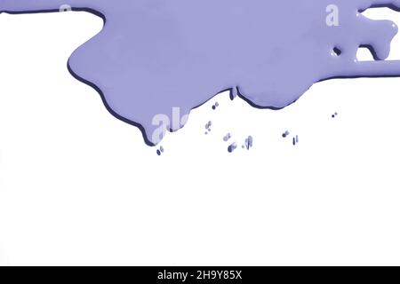 paint splashes isolated on white background, copy space Toned in color of the year 2022, very peri Stock Photo