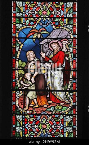 A stained glass window by Frederick Preedy, The Story of Abraham and Hagar, St Mary's Church, Old Hunstanton, Norfolk Stock Photo