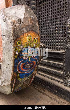 Face of Hindu deity, Durga, painted on the front of the giant Kumari Jatra chariot for a religious procession in Kathmandu, Nepal. Stock Photo