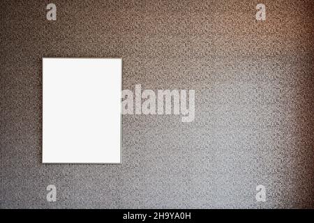 Blank photo or picture frame at the wall with clipping path for the inside, wall with retro wallpaper and copy space. stylish home decoration Stock Photo