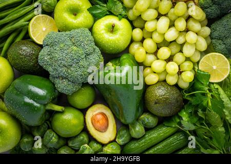 Assortment of raw organic green fruits and vegetables. Stock Photo