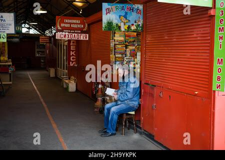 KYIV, UKRAINE - Oct. 17, 2021: Last day of the Demeevsky bazaar in Kyiv before its liquidation. Lots of people have lost their jobs. View of a typical Stock Photo