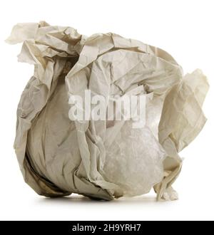 Wrinkled crumpled paper trash ball on a white background. Stock Photo