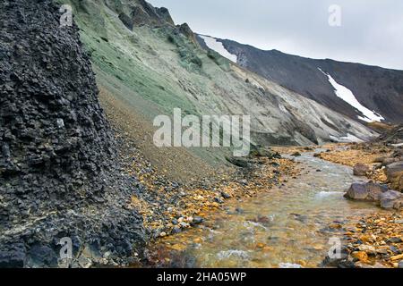 Green copper exposed in the Graenagil canyon at Landmannalaugar in the Fjallabak Nature Reserve, Sudurland in the Highlands of Iceland Stock Photo