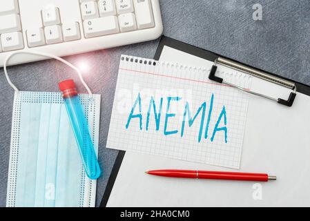 Text showing inspiration Anemia. Business overview condition where there deficiency of red cells of haemoglobin in blood Typing Medical Notes Stock Photo