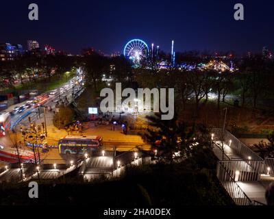 London, Greater London, England, December 04 2021: The Big Wheel of Winter Wonderland in Hyde Park as seen from the Marble Arch Mound. Stock Photo