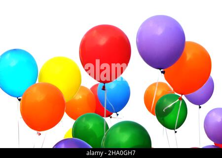 bunch of multicolored balloons in the city festival,isolated on white Stock Photo