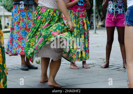 Salvador, Bahia, Brazil - December 06, 2015: Women dancing the traditional samba de roda of Bahia with colorful clothes. Salvador, Bahia, Brazil. Stock Photo