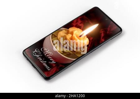Smartphone with Christmas image on the screen isolated on the white background Stock Photo