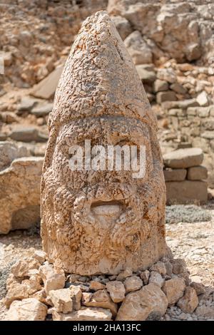 Stone heads carved from limestone rock on the Mountain of the Gods Stock Photo