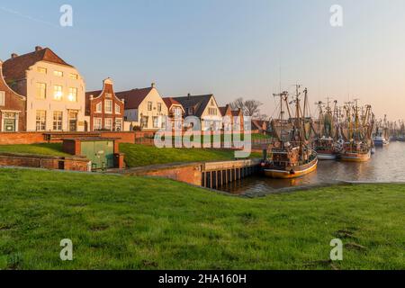 Evening view of the fishermens village Greetsiel, Germany Stock Photo