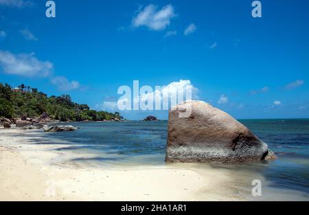 White sandy secluded beach Anse Citron or Lemon Bay Praslin Seychelles Stock Photo