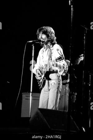 George Harrison performing at the Fillmore West in San Francisco circa 1972. Stock Photo