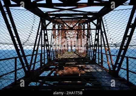 the design of an old rusty dilapidated bridge Stock Photo