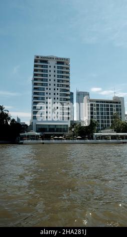 Mandarin Oriental Hotel, Bangkok  48 Oriental Avenue, Bang Rak, Bangkok, Thailand with lebua at State Tower in the background Stock Photo