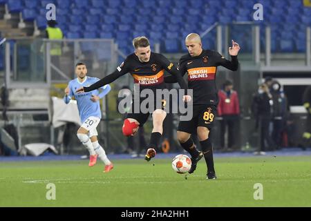 Rome, Italy. 09th Dec, 2021. Sofiane Feghouli of Galatasaray AÅ&#x9e; and M. Kerem AkturkoÄ&#x9f;lu of Galatasaray AÅ&#x9e; in action during the UEFA Europa League group E match between Lazio Roma and Galatasaray AÅ&#x9e; at Stadio Olimpico on 9th of December, 2021 in Rome, Italy. Credit: Independent Photo Agency/Alamy Live News Stock Photo