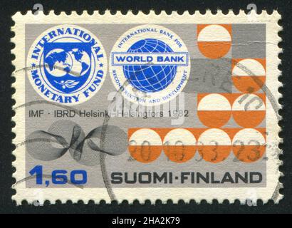 FINLAND - CIRCA 1982: stamp printed by Finland, shows Badges of the IMF and World Bank, circa 1982 Stock Photo