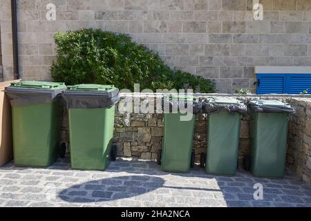 Green trash bins in a special place. Stock Photo