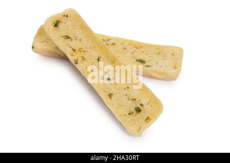 Studio shot of ciabatta bread with garlic flavoured olive oil and parsley cut out against a white background - John Gollop Stock Photo