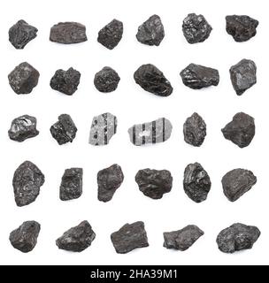 Anthracite hard stone coal lumps isolated on white background top view. Highest carbon content and energy density of all types of coal. Stock Photo