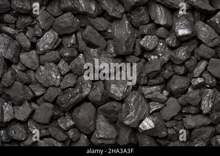 Coal texture top view. Natural black stone coal lumps background. Stock Photo