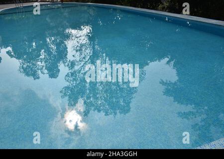 Swimming pool with blue and clear water Stock Photo