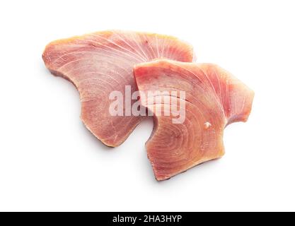 Raw tuna steak. Raw fish meat isolated on white background. Stock Photo