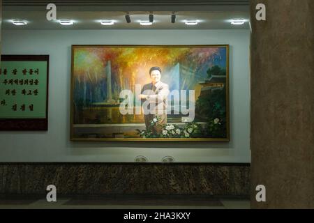 Pyongyang, North Korea - July 29, 2014: Portrait of Kim Jong Il on the wall in the corridor of the Grand People's Study House in Pyongyang. Stock Photo