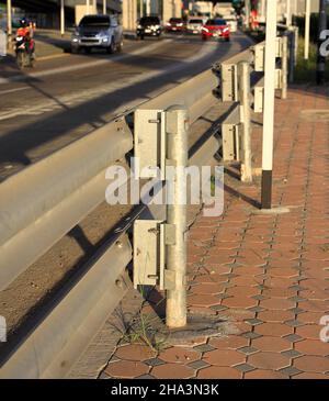 Barrier, Highway guarding rail for prevent the exit of the vehicle from the curb or bridge, Barrier of road, dividing strip. Stock Photo