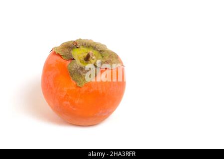 Ripe and bright persimmon fruit on white background Stock Photo