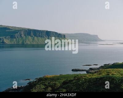 Looking south east across the green summer landscape of Loch Na Keal to Creag a Ghaill cliffs, Isle of Mull, Inner Hebrides, Argyll & Bute Scotland UK Stock Photo