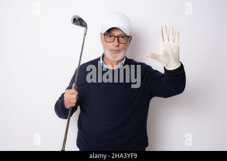 Male golfer making stop hand gesture isolated on a white background Stock Photo