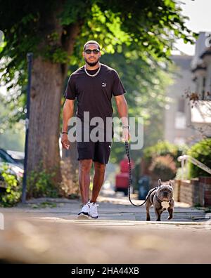 Cricketer Chris Jordan and his French Bull dog Griffin. Editorial Use Only Picture by Jim Holden Stock Photo