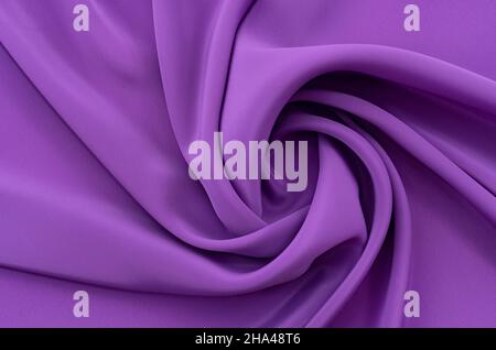 A piece of burgundy, violet, blue cloth. Fabric texture for background and design works of art, beautiful wrinkled pattern of silk or linen. A crumple Stock Photo