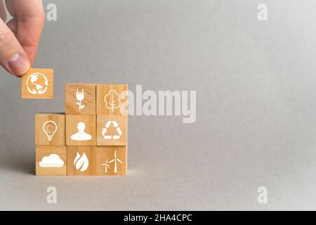 The concept of caring for nature by using ecologically clean energy with copy space. Stock Photo