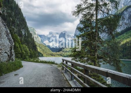 hiking trail in around gosau lake with dachstein peaks in background,austria. Stock Photo