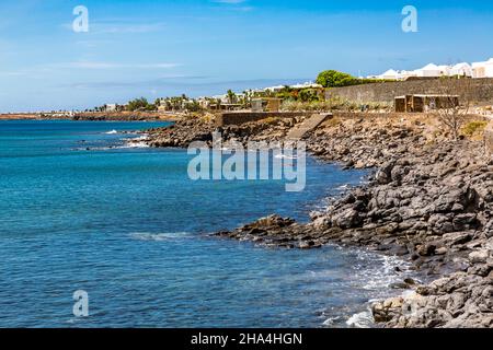 lava coast,promenade maritima,playa blanca,lanzarote,canaries,canary islands,spain,europe Stock Photo